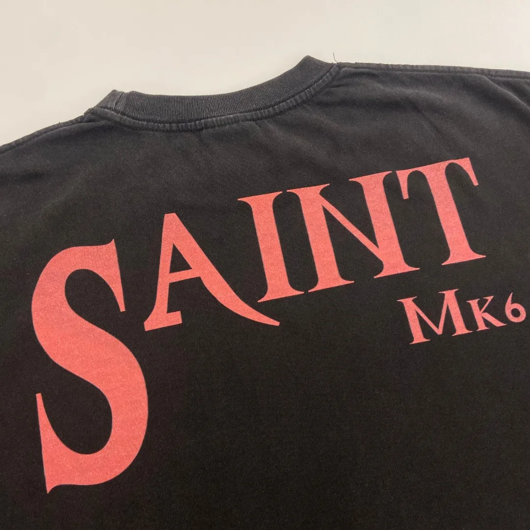 American fashion Saint Michael lost boy print retro washed and distressed Vintage loose short sleeves. Digital white ink direct printing. The fabric is breathable and the pattern is three-dimensional and clear. Fabric: Double yarn 240g Style number: S821 Size: S-M-L-XL Color: Washed black Price: P118
